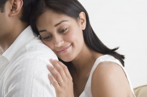 Wife Touching Husband from Behind